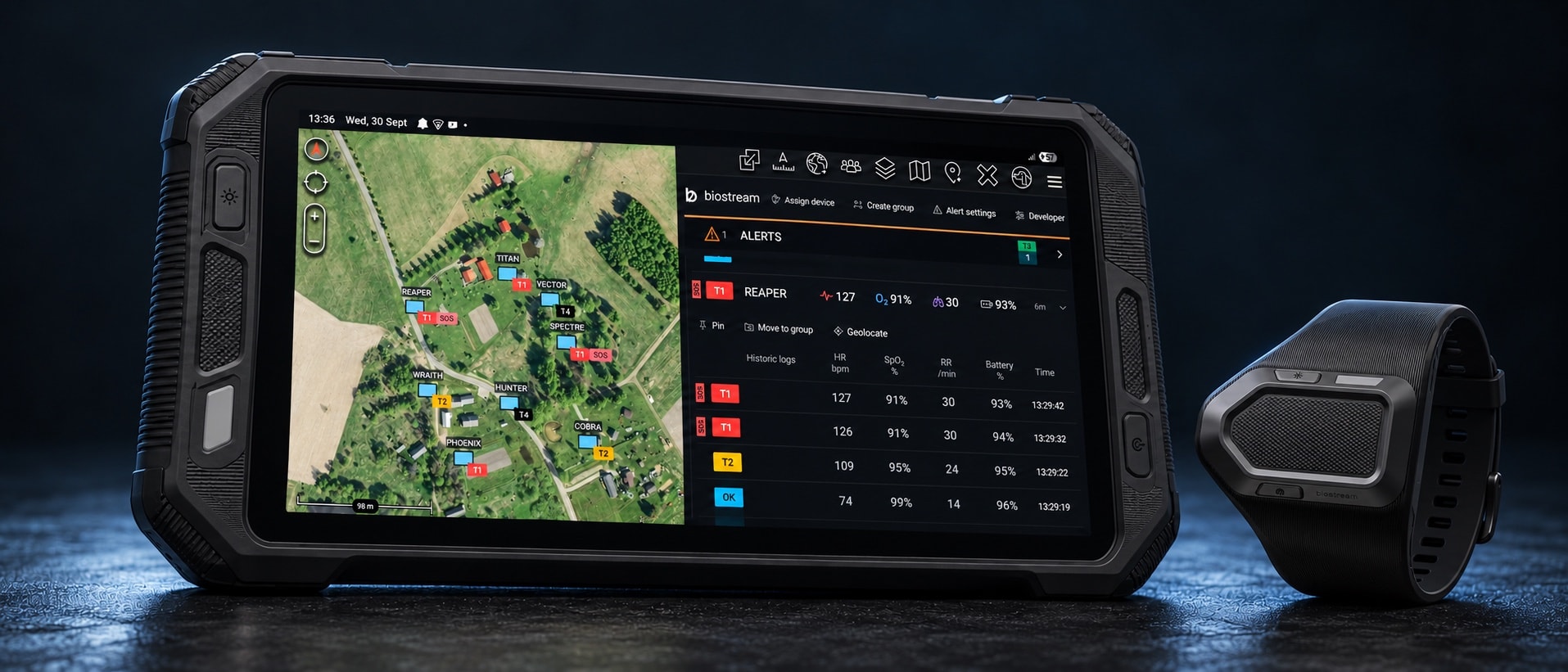 The Biostream Tag wearable beside a rugged tablet showing wearers on a map with live vital signs and triage alerts.